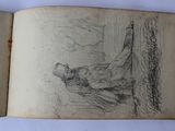 an old book with a drawing of a man sitting on a bench