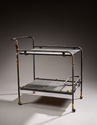 a metal and glass serving cart on a white surface