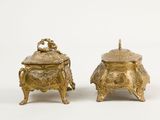 pair of antique brass candlesticks and covers
