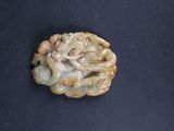 a small piece of food that is on a black surface