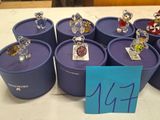 a lot of figurines that are sitting on a table