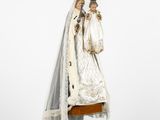 an image of a statue of a woman wearing a veil and a crown