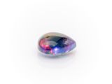 a rainbow colored oplite gems on a white background
