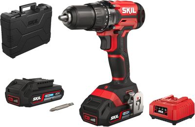 une perceuse sans fil avec deux batteries et un coffret à outils