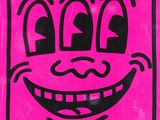 pink and black drawing of a smiling face on a pink background