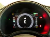 the dashboard of a car with a digital display on it