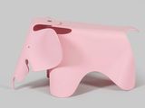 pink elephant shaped stool on grey background with grey background