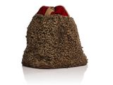 un sac en papier brun orné d'un nœud rouge