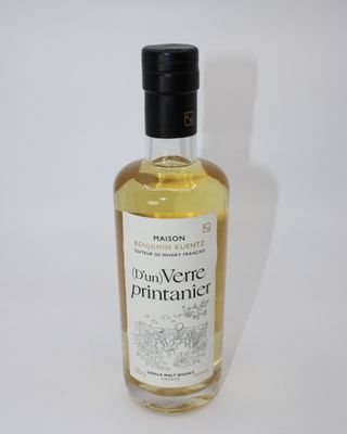 a bottle of rumverie pattaniier on a white background