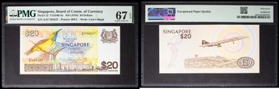 three different types of currency are on display in a display case