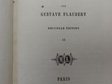 an open book with a black and white title on it