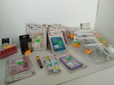 many different types of toothbrushes and other items on the counter