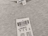a close up of a gray shirt with a barcode on it