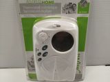 a white electronic device that is in the packaging