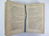 an old book open to a page with a blue border
