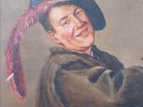 a painting of a man with a feather on the wall
