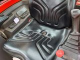 an image of a tractor seat in the back of a truck