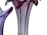 two vases that are sitting side by side on a white background