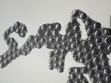 a pencil drawing of a bunch of grapes on a table