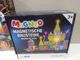 a box of magnetic building blocks on a table