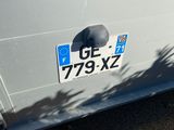 a white van parked on the side of the road