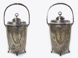 pair of silverplated ice buckets with handles and handles