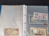 a folder with a lot of money inside of it