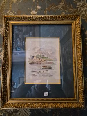 une photo d'un tableau accroché au mur