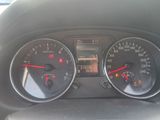 two gauges on the dashboard of a car
