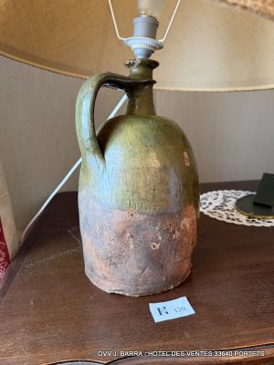 a lamp that is sitting on a table with a lamp on it