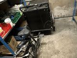 a bike that is parked in a garage next to a shelf