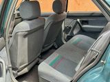 two seats in the back of a small car