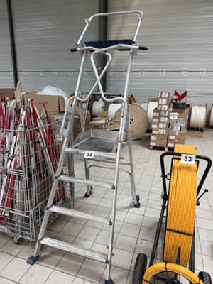 a picture of a ladder and a cart in a warehouse