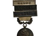 an image of a medal with a ribbon around it on a white background