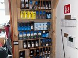 a room with a lot of items on the shelves