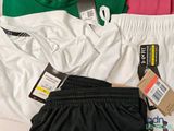 three pairs of underwear that are laying on a bed