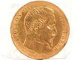 an image of a gold coin with a man ' s face on it