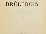 an open book with a black and white title on it
