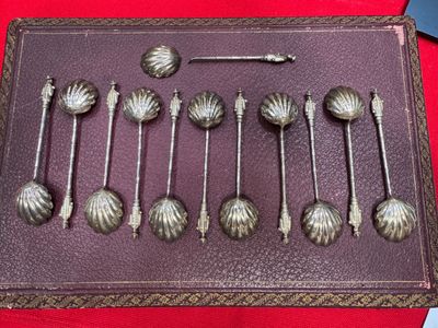 a lot of spoons that are on a table