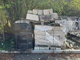 a pile of boxes sitting on the side of the road