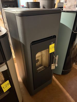 a small stove in the middle of a room