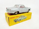 a toy car sitting on top of a box
