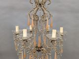 an image of a chandelier hanging from the ceiling in a room