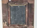 an old wooden picture frame with a chalkboard in the middle