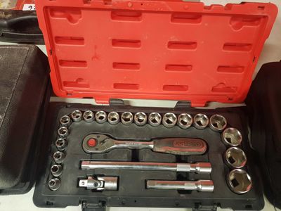 a tool kit that is sitting on a table
