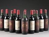 six bottles of red wine lined up in a row