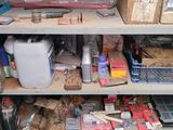 a shelf with many items on it in a room