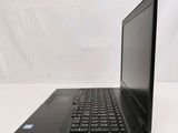 a close up of a laptop computer sitting on top of a white table