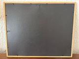 a close up of a wooden box on a table