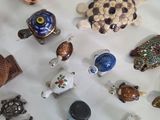 a lot of small figurines that are on a table